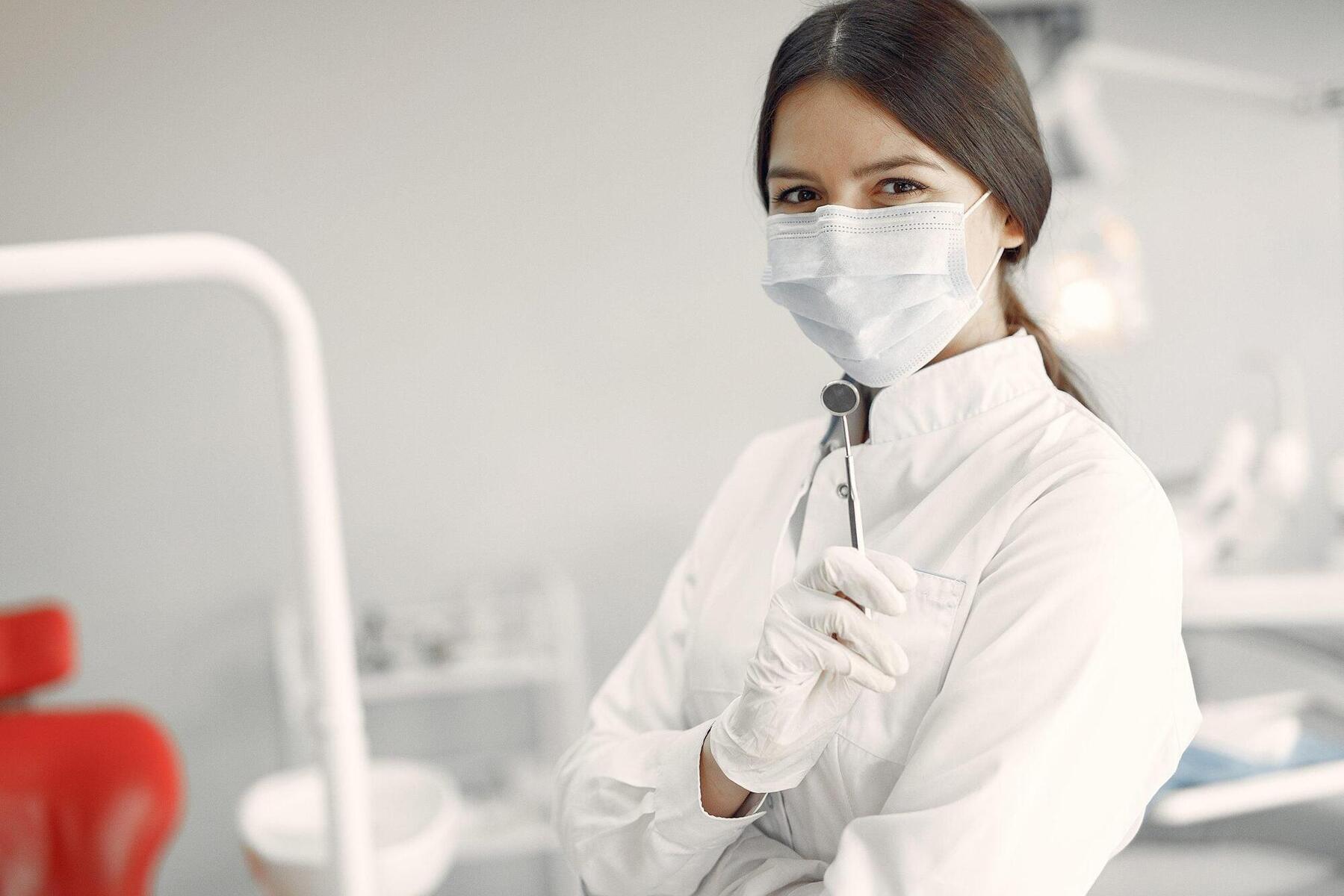 beautiful-dentist-working-dental-clinic-scaled.jpg